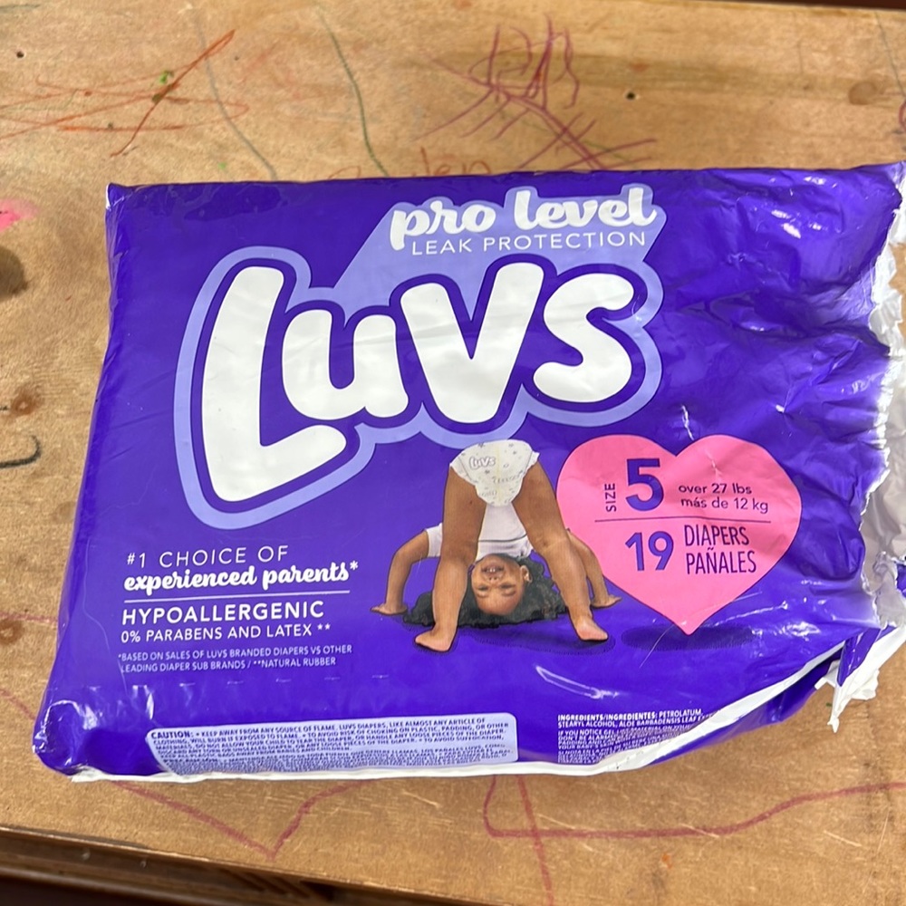 Open bag luvs diapers size 5 16 left